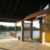 A Pavilion with restrooms is located on the bank of the lake in the park.